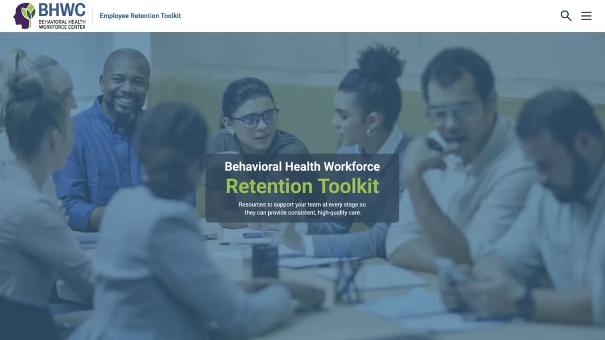 Blue transparent image of a group of employees sitting around a table in a meeting